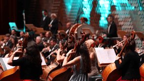 An orchestra is a large instrumental ensemble typical of classical music, which combines instruments from different families. - Powered by Shutterstock - Get 15% off with code: PIKWIZARD15