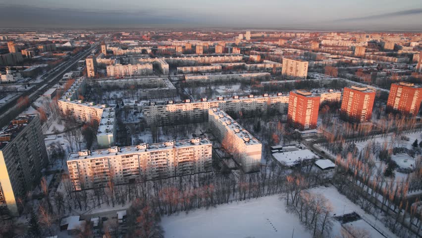 Aerial view. Winter panorama of the city of Tolyatti in the Samara region. Snow-covered streets of a provincial and industrial Russian city. Royalty-Free Stock Footage #1102519787
