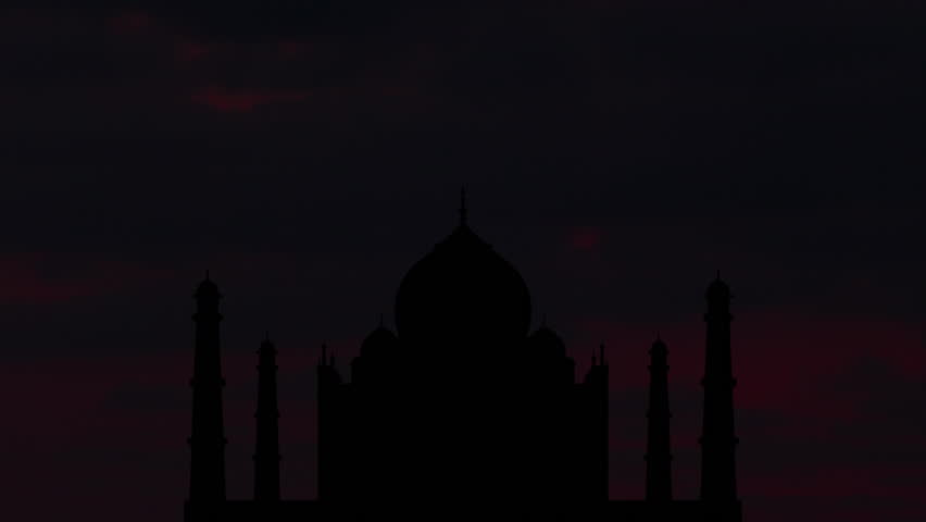 Silhouette of an Indian temple on the background of the sunrise. Royalty-Free Stock Footage #1102530793