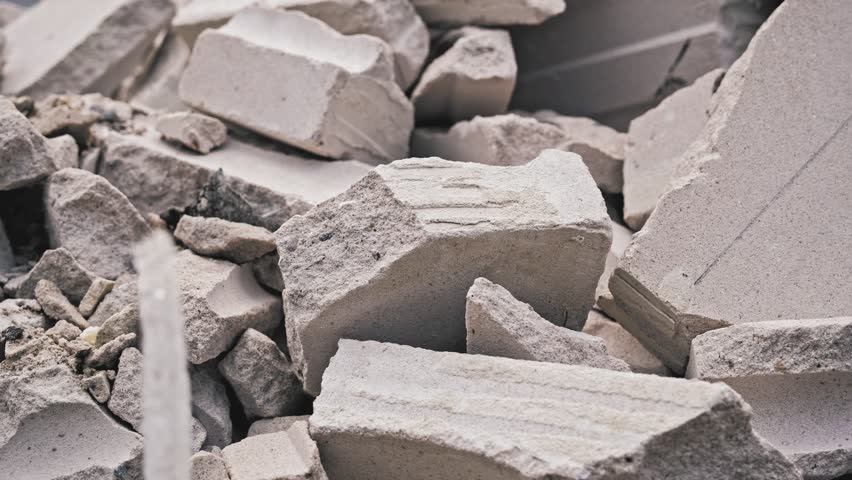 Pile of Rubble Industrial Construction Waste Concrete Block Air Brick Pieces and Hazardous Materials Royalty-Free Stock Footage #1102535025