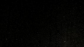 Drops pouring down night window. A view of rain drops on the dark window during night time. - Powered by Shutterstock - Get 15% off with code: PIKWIZARD15