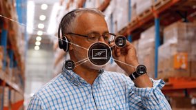 Animation of network of icons over caucasian male senior supervisor checking stock at warehouse. Global networking and logistics business technology concept - Powered by Shutterstock - Get 15% off with code: PIKWIZARD15