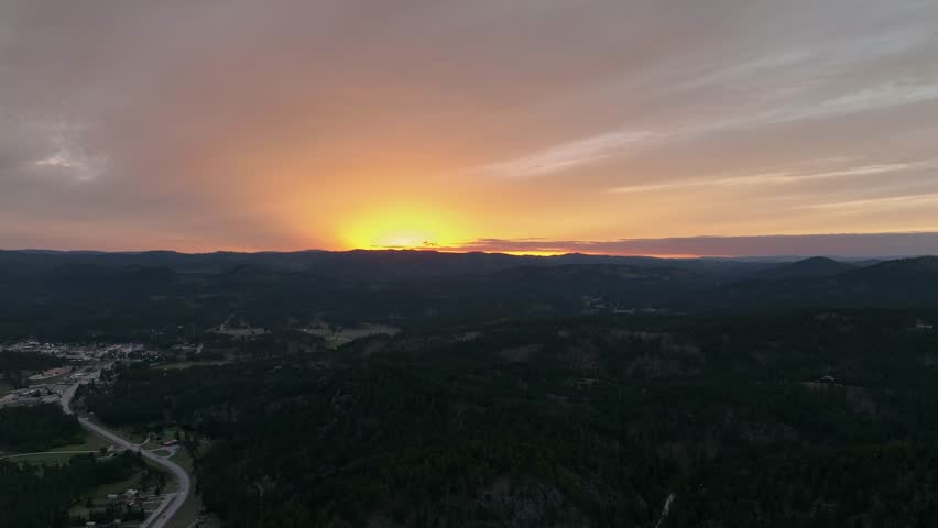 Drone shot of the sun rising over South Dakota