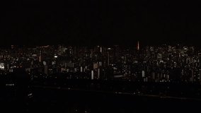 TOKYO, JAPAN : Sunrise time lapse shot of CITYSCAPE of TOKYO and Mount Fuji. Aerial view of buildings at central downtown area. Japanese urban dawn city, travel and tourism concept video in 4K.