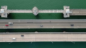Phuket, Thailand: Aerial top down drone footage of the famous Sarasin bridge linking Phuket island with Phang Nga province in mainland Thailand.