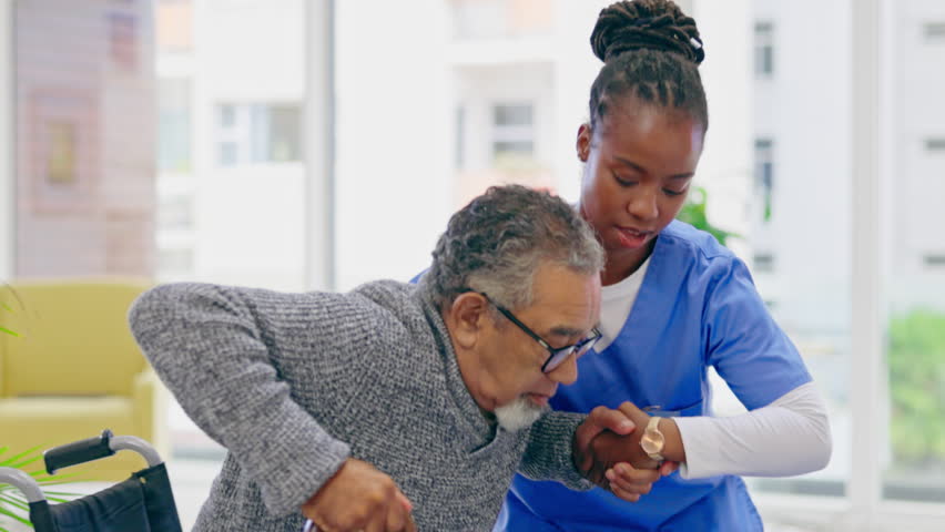 Senior man, nurse and help walking in house for support, wellness or rehabilitation with care for body. Nursing home, black woman and elderly male with exercise, helping hand or physiotherapy service Royalty-Free Stock Footage #1102562091