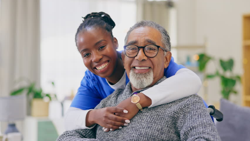 Elderly man, nurse and hug with face, smile and care in house for retirement, wellness and happiness. Nursing home, black woman and senior male with portrait, support and happy for healthcare service Royalty-Free Stock Footage #1102562455