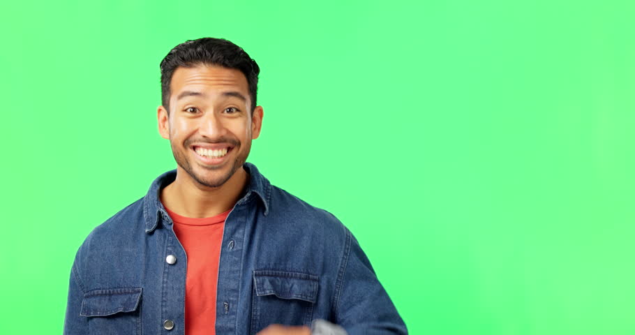 Face, green screen and Asian man pointing to you, smile and direction on a studio background. Portrait, male and person with selection, invitation and hand gesture for motivation, choice and decision