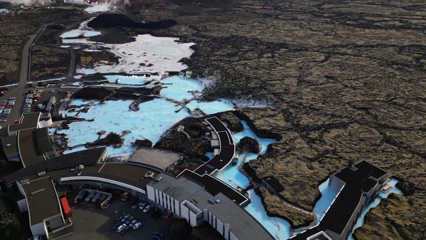 Blue Lagoon bath panoramic aerial view geothermal in winter time near Reykjavik, Iceland. Royalty-Free Stock Footage #1102563695