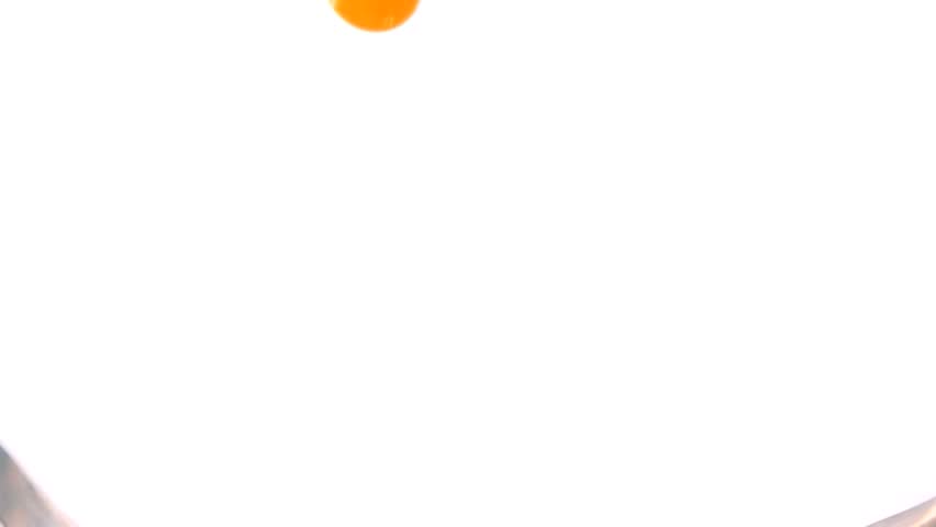 Close-up of an appetizing wave of multifruit juice swirls inside the glass