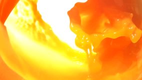 Close-up of an appetizing wave of multifruit juice swirls inside the glass - Powered by Shutterstock - Get 15% off with code: PIKWIZARD15