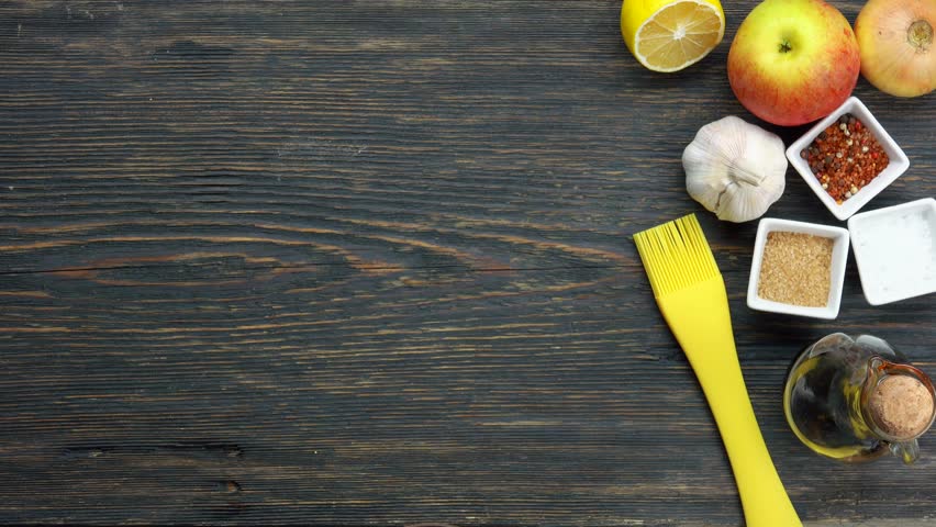 Top view Duck in a glass plate is placed on the table next to different ingredients. High quality 4k footage