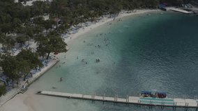 Aerial video over a tropical island beach during summer vacation in Labadee, Haiti Caribbean Islands