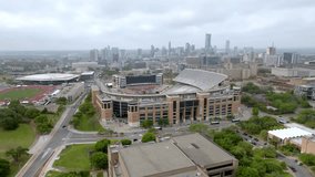 Darrell K. Royal Memorial Stadium on the campus of the University of Texas in Austin, Texas with drone video circling.