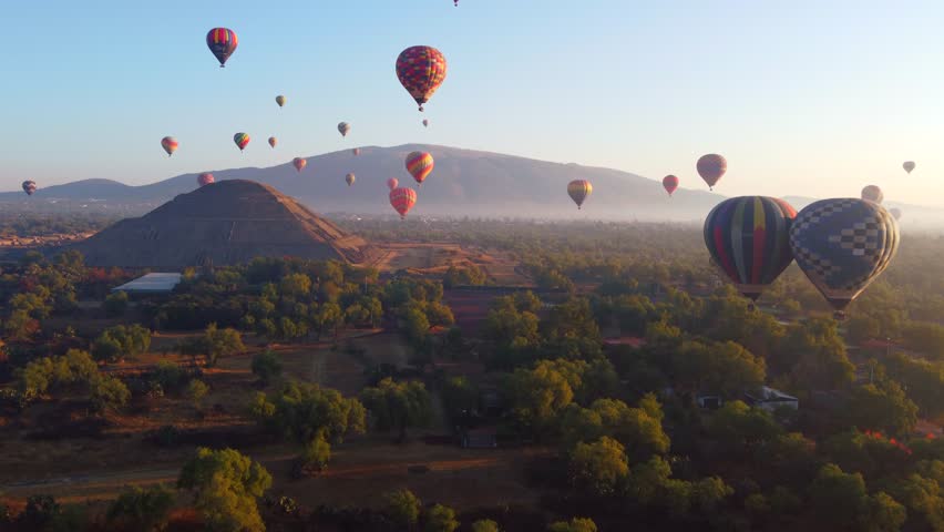 Sunrise on hot air balloon over the Teotihuacan pyramid Royalty-Free Stock Footage #1102600743