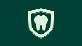 White Dental protection icon isolated on green background. Tooth on shield logo. 4K Video motion graphic animation.