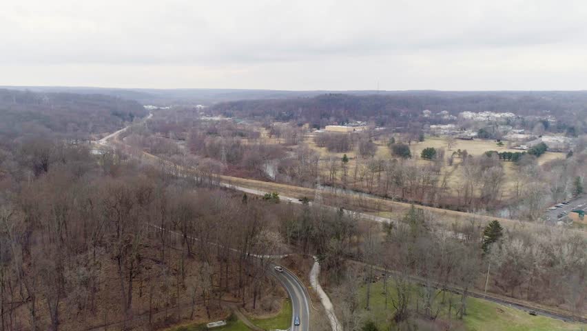 Drone of suburban Cuyahoga Valley Ohio during cold winter - exposing suburban area