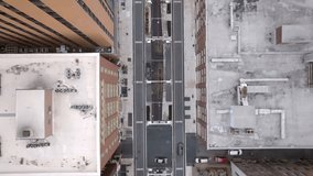 Downtown Indianapolis, Indiana with drone video looking down above buildings and street.