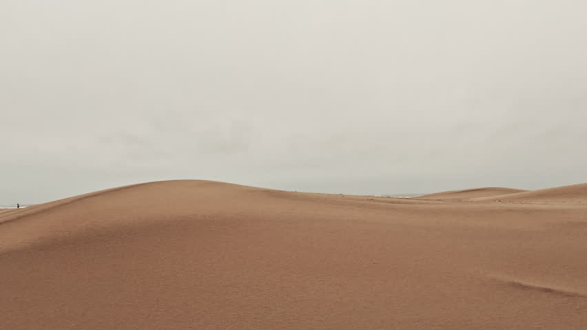 Side view of car drive on Road in desert during sand. 