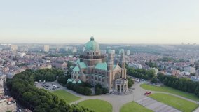 Inscription on video. Brussels, Belgium. National Basilica of the Sacred Heart. Early morning. Name is burning, Aerial View, Point of interest