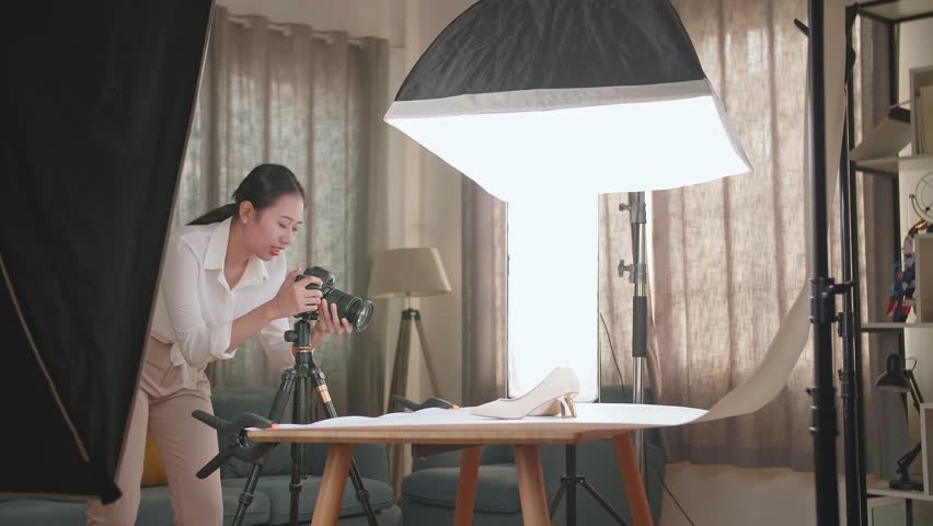 Asian Female Photographer Taking Photos Of Women