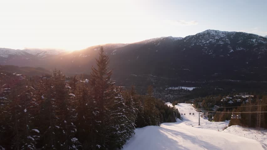 Mountain sunset ski resort, snow, high alpine, Whistler BC. 4K 24FPS.