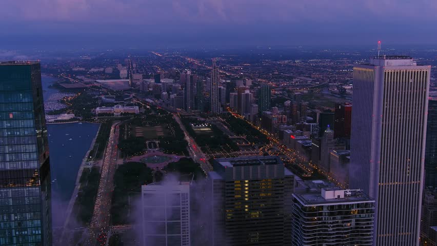 Nighttime scape of the descending sunset of Chicago Skyline