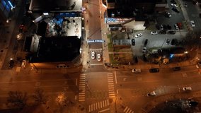 Beale Street in Memphis, Tennessee at night with drone video moving forward and tilting up.
