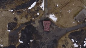 Isolated red roof home in barren Iceland. Captured in high definition.