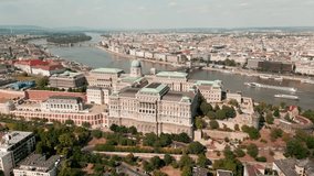 Aerial skyline view of Budapest and River Danube, Hungary. Aerial video from a drone shows the historical Buda Castle near the Danube. Hill in Budapest, Hungary.