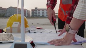 Engineering team meeting on construction site, Perfect for corporate training, educational videos - Powered by Shutterstock - Get 15% off with code: PIKWIZARD15
