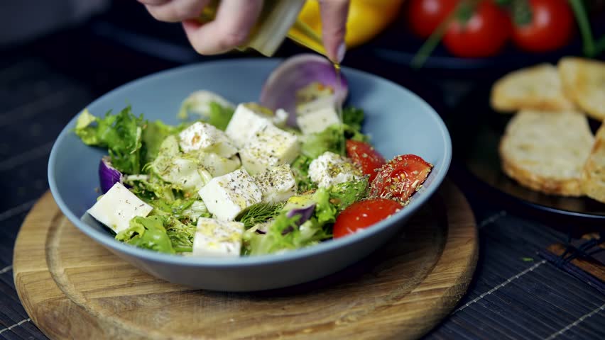 Eat Organic Vegan Lettuce Salad. Dieting Healthy Food. Vegan Raw Food On Diet. Vegetarian Weight Loosing Salad Balanced Food. Superfood Organic Food Salad On Dieting. Lettuce Leaves Salad With Feta Royalty-Free Stock Footage #1102651341