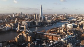 Establishing Aerial View Shot of London UK, United Kingdom, Shard, Tower of London, Tower Bridge, 
St Katharine Docks Marina, beautiful day, slow circling
