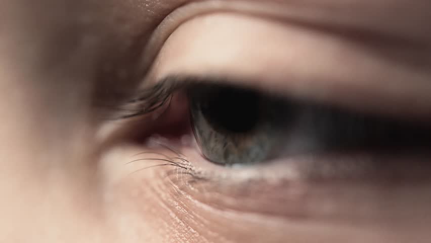 Eyes of Young Woman Looking at Side Close-up. Beautiful Iris and Pupil of Eyeball with Lens Under Eyelid with Lashes. Macro Zoom Image of Optical Cornea and Eye Retina of Abstract Female Person Indoor Royalty-Free Stock Footage #1102680825