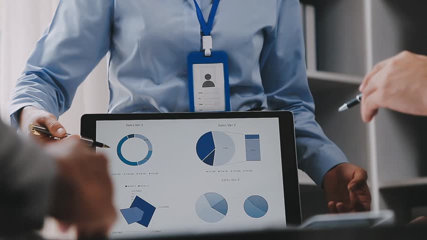 Businesswoman or accountant working Financial investment on calculator, calculate, analyze business and marketing growth on financial document data graph, Accounting, Economic, commercial concept.