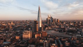 Establishing Aerial View Shot of London UK, United Kingdom, Shard and City of London, circle right
