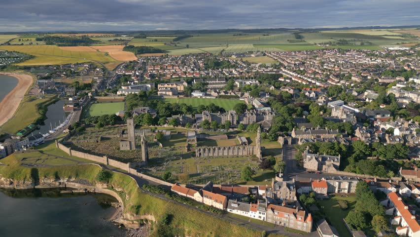 Wide generic aerial view of St Andrews town in Scotland UK Royalty-Free Stock Footage #1102694537