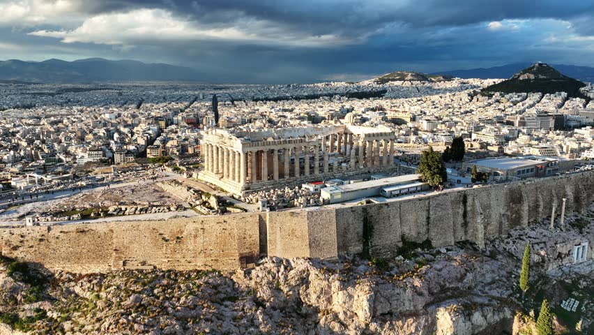 Aerial drone dramatic video above unique Acropolis hill and the Parthenon an Unesco world heritage site, Athens historic centre, Attica, Greece Royalty-Free Stock Footage #1102696889