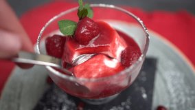 Indulgent Delight: White ricotta jello with strawberry sauce, slow-motion spoonful, tempting dessert, smooth and creamy texture - Powered by Shutterstock - Get 15% off with code: PIKWIZARD15