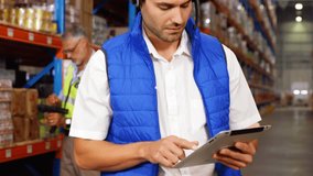 Animation of network of connections with icons over diverse workers working in warehouse. Global connections, shipping and delivery concept digitally generated video. - Powered by Shutterstock - Get 15% off with code: PIKWIZARD15