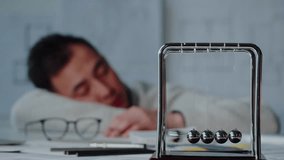 Tired Korean architect designer sleeping. Professional engineer, overworked interior creator relaxing after working with new house project, blueprint plan, drafting building. - Powered by Shutterstock - Get 15% off with code: PIKWIZARD15