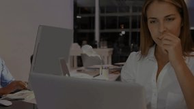 Animation of financial data processing over caucasian businesswoman using computer in office. Global connections, business, computing and data processing concept digitally generated video.