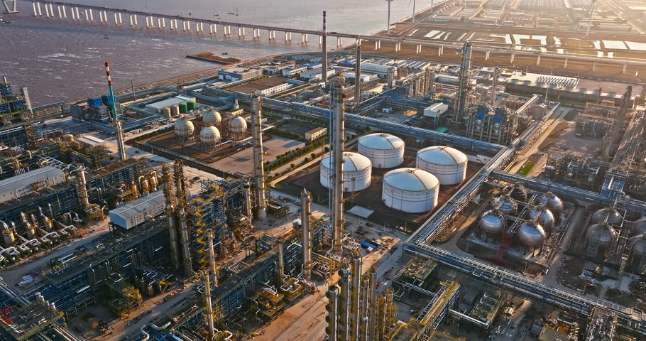 Aerial view of oil and gas petrochemical industrial with Refinery factory.  Royalty-Free Stock Footage #1102729599