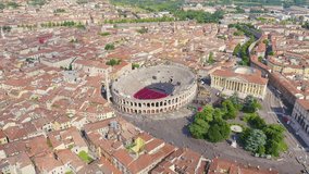Inscription on video. Verona, Italy. Flying over the historic city center. Arena di Verona, summer. Lightning strikes the letters, Aerial View, Point of interest