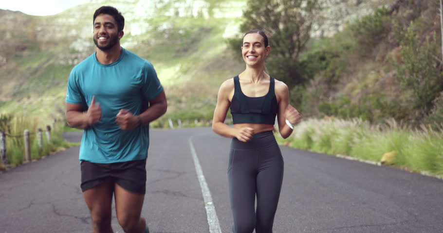 Nature, running and couple of friends on road for cardio workout, exercise and training in countryside mountains. Personal trainer, sports woman or runner people race with happy fitness or body goals