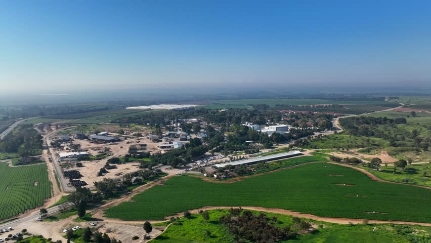 Aerial view of Kibbutz Beeri, farming and agriculture village in Israel Royalty-Free Stock Footage #1102741471