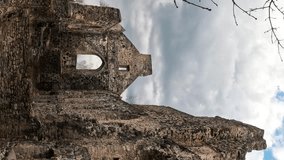 Ruins of Sigulda Medieval Castle, Latvia. Old Fortress in Sunny Spring Day. Vertical 4K Video Shot