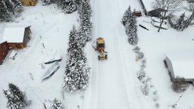 Drone video captures the power and a snow plow in action as it clears snow in the winter wonderland of Alaska.