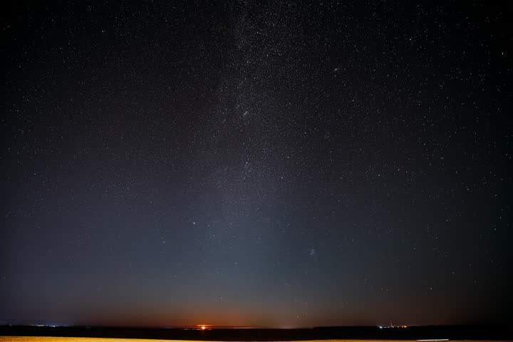 Night Starry Sky Stars And Meteoric Track Trails. Trace Of Sun. Spin Of Stars In Sky. 4k Spin Trails Of Stars Timelapse. Sunrise Sky Natural Background. Unusual Stars Effect Sky. Star Trails On Night