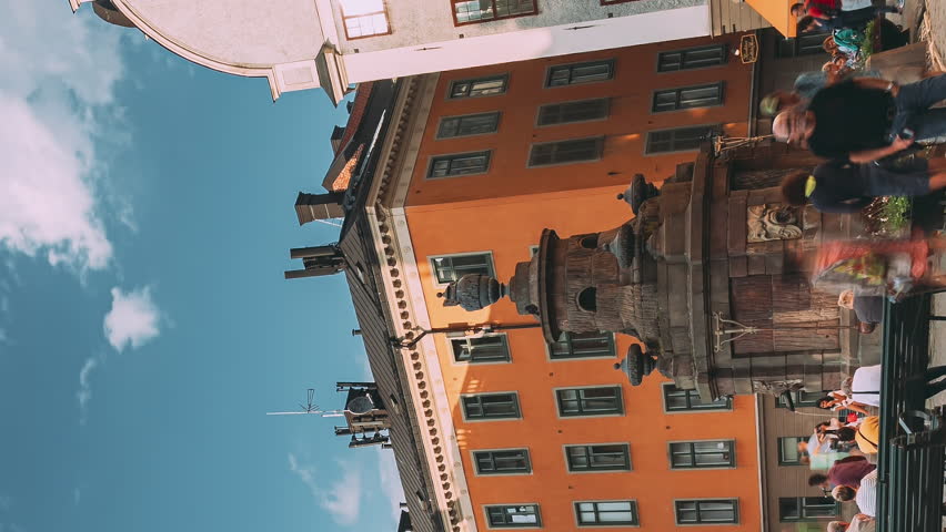Stockholm, Sweden Tourists People Walking Near Nobel Museum On Stortorget Square In Summy Summer Day. Vertical Footage Video Famous Popular Place In Old Town. City Hyperlapse.